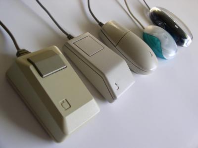 Photo of the variety of different Apple mice used in the past.